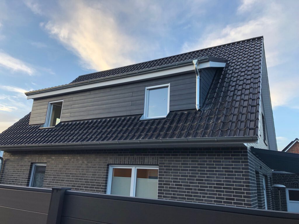 Schleppdachgaube Dennis Russmeier